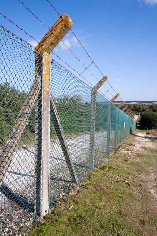 Chain Link Fence with Barbed Wire